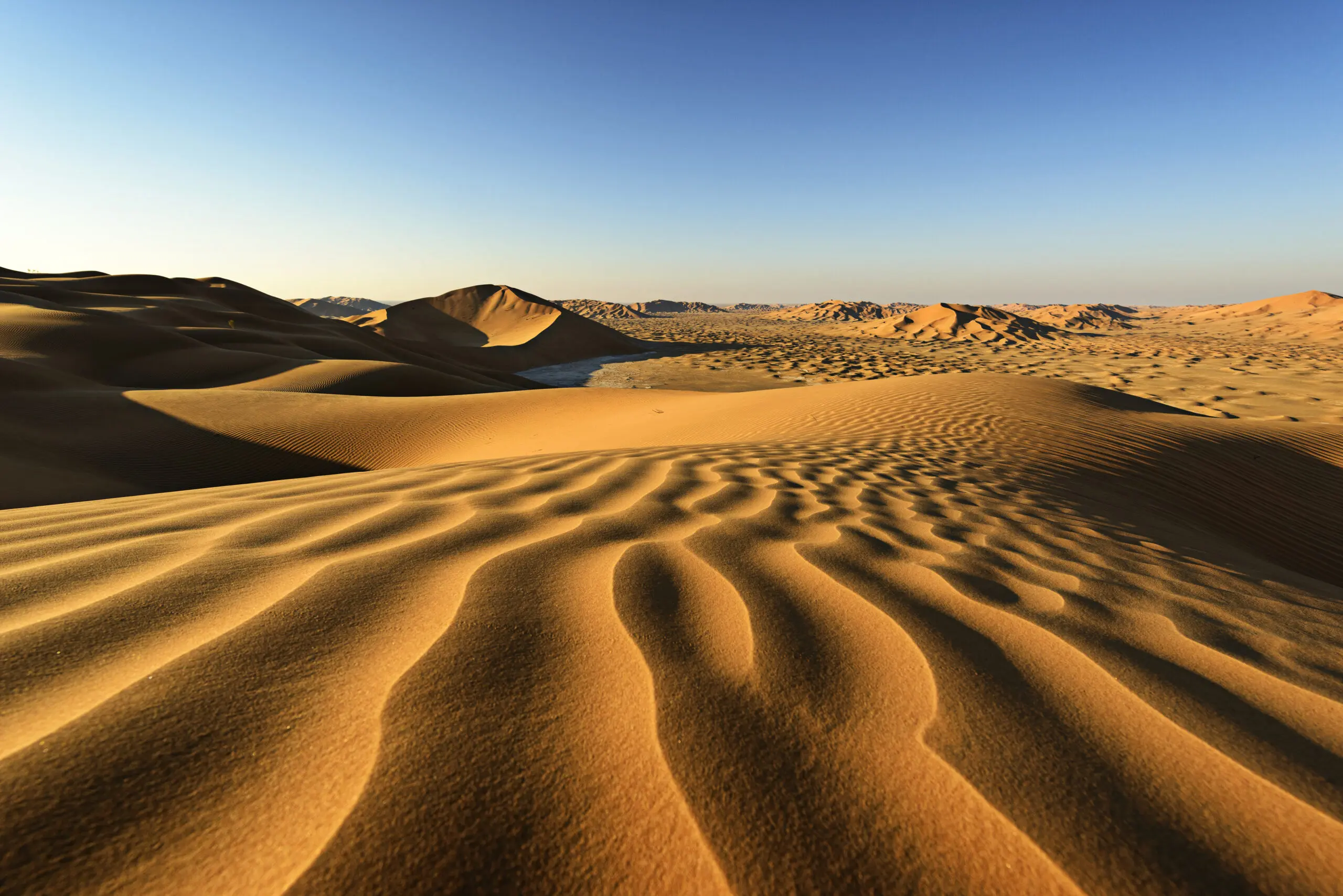 Wandbild (4684) Robertz Mark – Wüste Rub al-Chali im Morgenlicht präsentiert: Details und Strukturen,Natur,Landschaften,Wüste,Asien,Detailaufnahmen,Luftaufnahmen,Steine,Sonstige Naturdetails,Erde